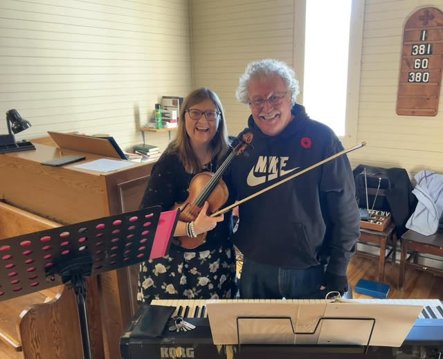 Live music for St. Luke's Remembrance Service was provided by violinist Debbie Miles and pianist Peter Grant. Music selections included 'White Cliffs of Dover' and 'Rise Again'.